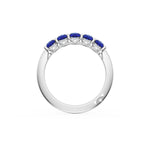 Round Cut Blue Sapphire Eternity Band in 18kt White Gold