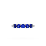 Round Cut Blue Sapphire Eternity Band in Platinum